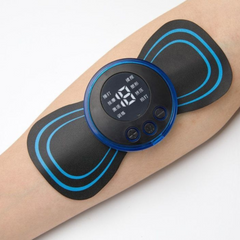 Electrotherapy device on a person's arm with digital display