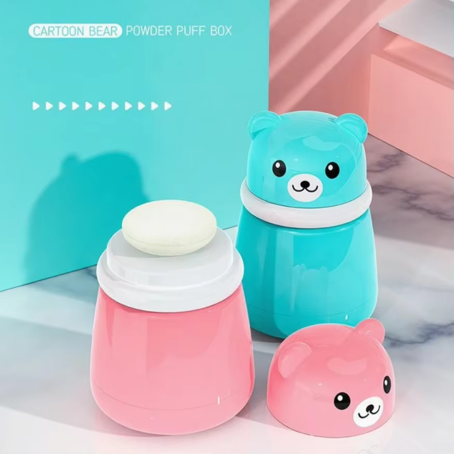 Cartoon bear powder puff box set with a blue and pink design on a light background.